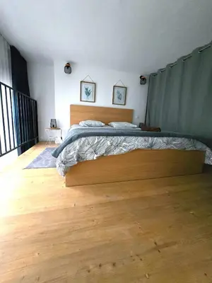 Un ou plusieurs lits dans un hébergement de l'établissement Loft Esprit & Lumière