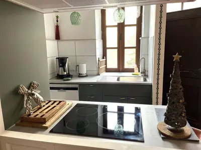 Cuisine ou kitchenette dans l'établissement labarretaine , une maison de caractère
