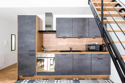Cuisine ou kitchenette dans l'établissement Duplex Standing - Hyper Centre - Tout équipé