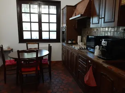 Cuisine ou kitchenette dans l'établissement La villa Dakoté