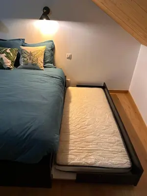Un ou plusieurs lits dans un hébergement de l'établissement Le Pied du Loup - gîte proche Cluny au calme 6-7 personnes