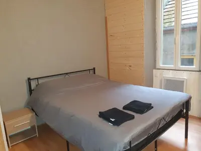 Un ou plusieurs lits dans un hébergement de l'établissement Appartement VanSuly 1