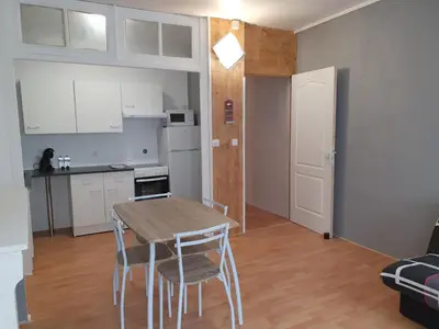 Cuisine ou kitchenette dans l'établissement Appartement VanSuly 1