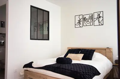 Un ou plusieurs lits dans un hébergement de l'établissement Le Condorcet - Apt 2 prs, en centre ville