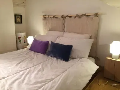 Un ou plusieurs lits dans un hébergement de l'établissement CHARMING FLAT IN HISTORICAL CENTRE