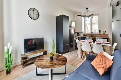 Coin salon dans l'établissement Appartement Le Chaleureux Chalon - Hyper-Centre