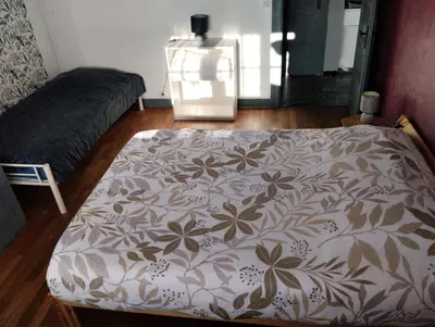 Un ou plusieurs lits dans un hébergement de l'établissement Bel appartement a la campagne avec magnifique vue