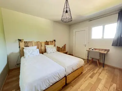 Un ou plusieurs lits dans un hébergement de l'établissement Hôtel En Tilleul