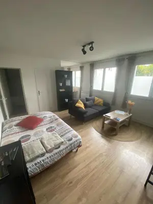 Un ou plusieurs lits dans un hébergement de l'établissement Dijon - Grand studio proche parc Darcy & gare