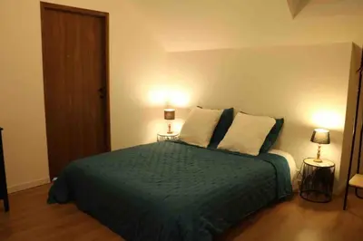 Un ou plusieurs lits dans un hébergement de l'établissement Maison Céleste