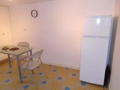 Cuisine ou kitchenette dans l'établissement le bienvenu