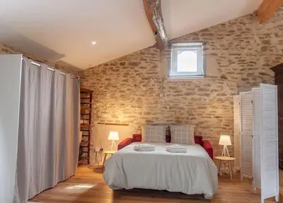 Un ou plusieurs lits dans un hébergement de l'établissement La Grange de Johanni
