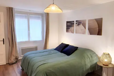 Un ou plusieurs lits dans un hébergement de l'établissement Maison (gite) Le Petit Plasne dans le Jura