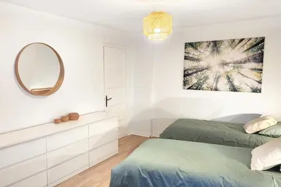 Un ou plusieurs lits dans un hébergement de l'établissement Maison (gite) Le Petit Plasne dans le Jura