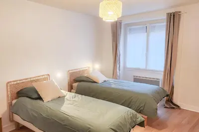 Un ou plusieurs lits dans un hébergement de l'établissement Maison (gite) Le Petit Plasne dans le Jura