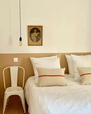 Un ou plusieurs lits dans un hébergement de l'établissement L’appartement 39