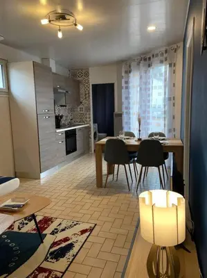 Cuisine ou kitchenette dans l'établissement Le Saint-Amour appartement classé 2 étoiles