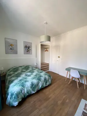 Un ou plusieurs lits dans un hébergement de l'établissement Le VH - Appartement 3 chambres