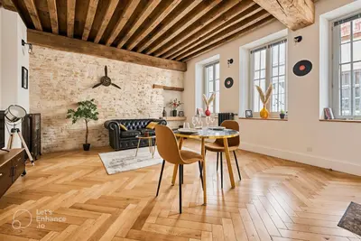 Coin salon dans l'établissement Le Rousseau - Appartement & Suite en Hypercentre