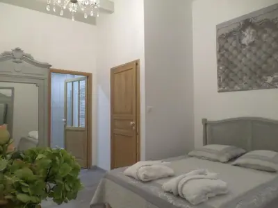 Un ou plusieurs lits dans un hébergement de l'établissement Chambres d'Hôtes L'Escale