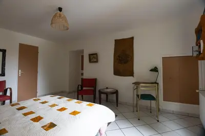 Un ou plusieurs lits dans un hébergement de l'établissement Chambre indépendante dans le moulin