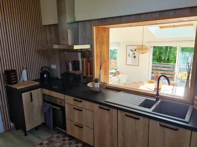 Cuisine ou kitchenette dans l'établissement La Maison des 4 moineaux